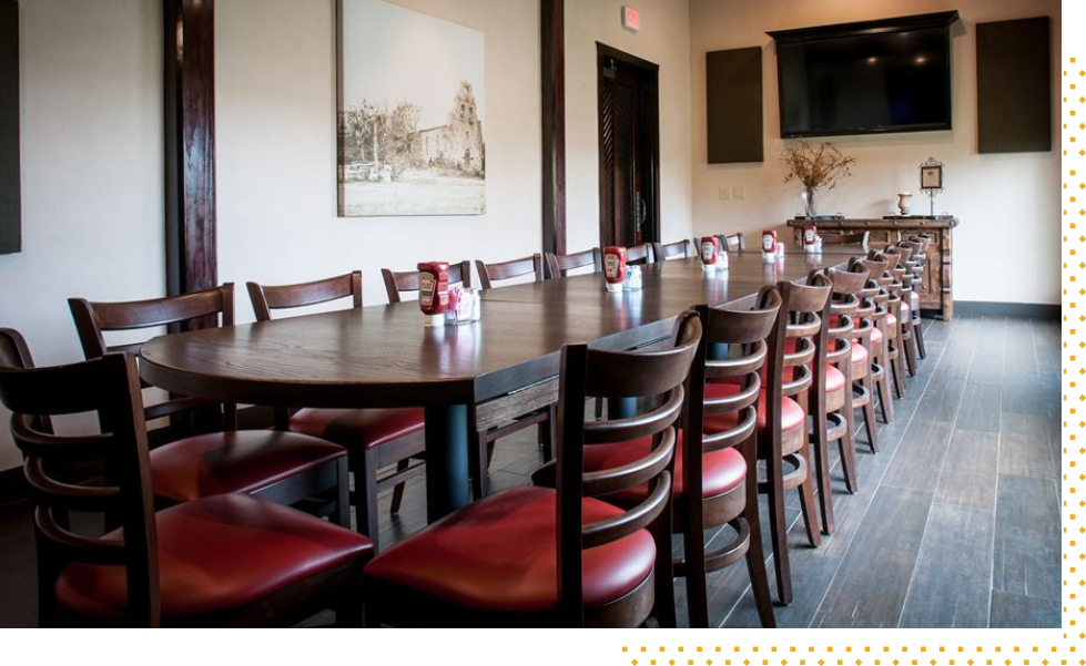 The Mission Room set with one long oval table