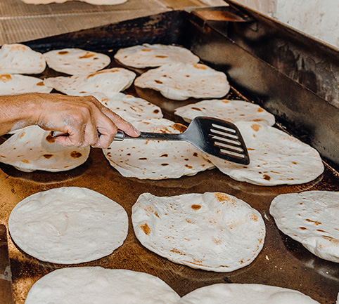 Fresh tortillas on the griddle