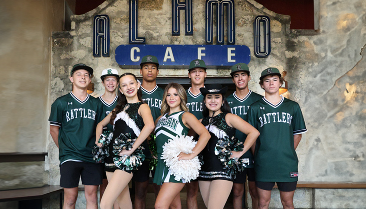 A high school team celebrating at Alamo Cafe