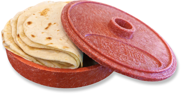 A stack of fresh flour tortillas in a warmer